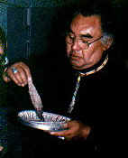 Larry Cloud-Morgan smudging with sage bundle
